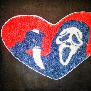 Heart-Shaped Art Rug with Red and Blue Design